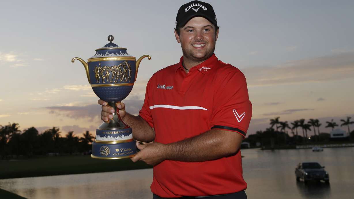 Reed, dressed like Tiger, gets a big win at Doral