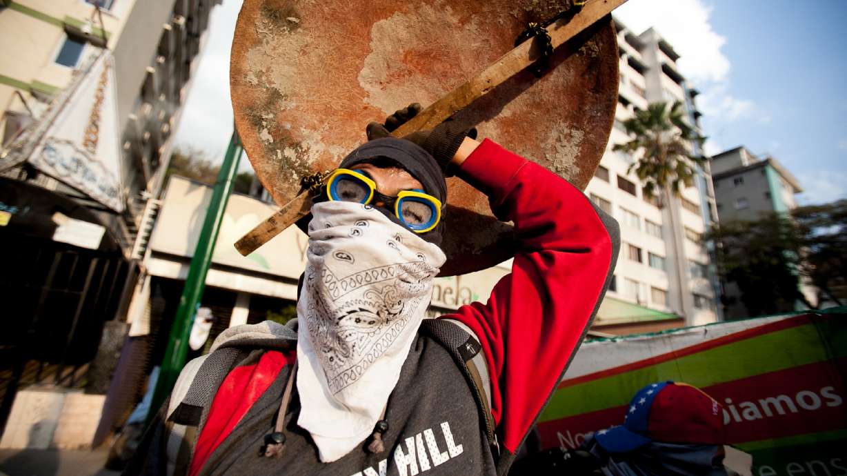 Venezuela unrest plays out daily in posh district