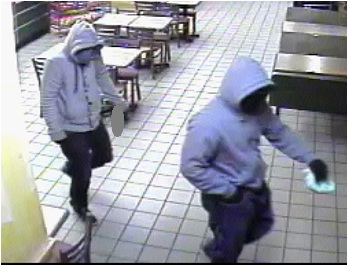 2 men rob restaurant; police release photos