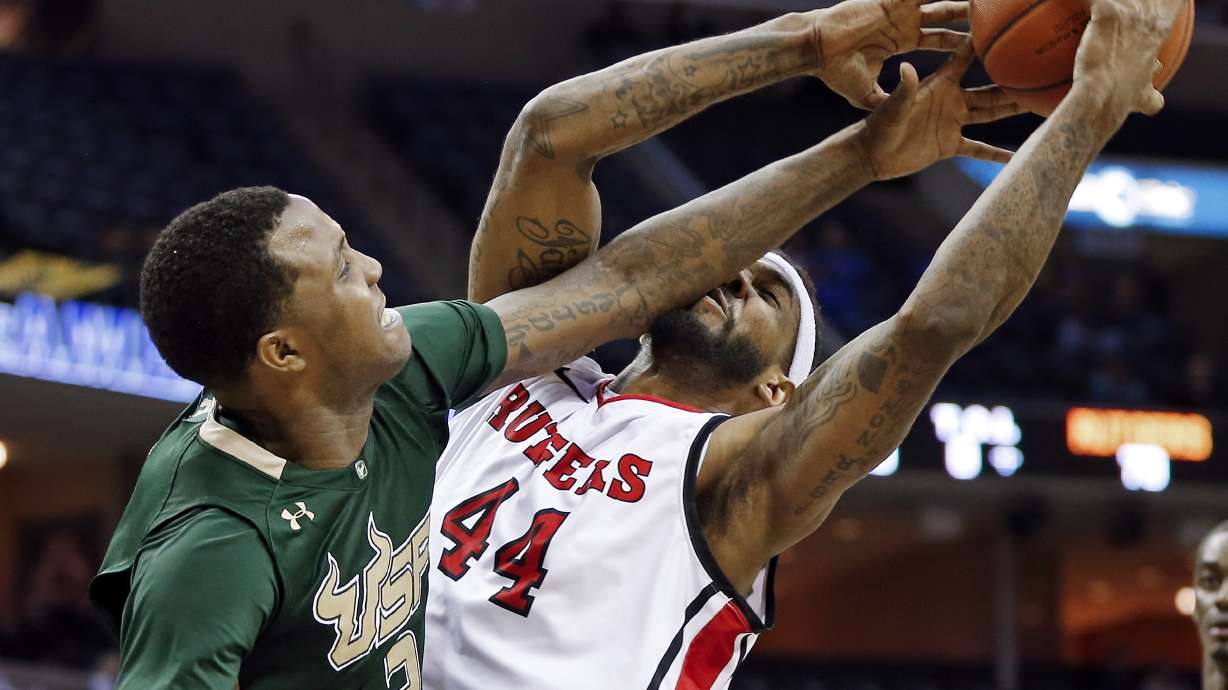 Moore leads Rutgers past South Florida 72-68