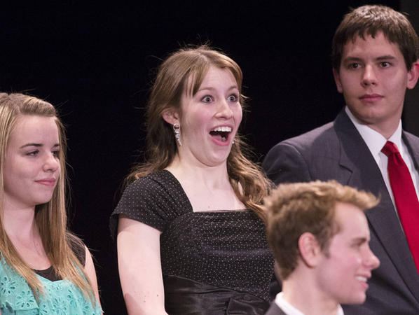 RIverton's Amber Barron, reacts as she is
announced as the Science winner during the 2014
Sterling Scholar awards Wednesday, March 12,
2014 at Cottonwood High.