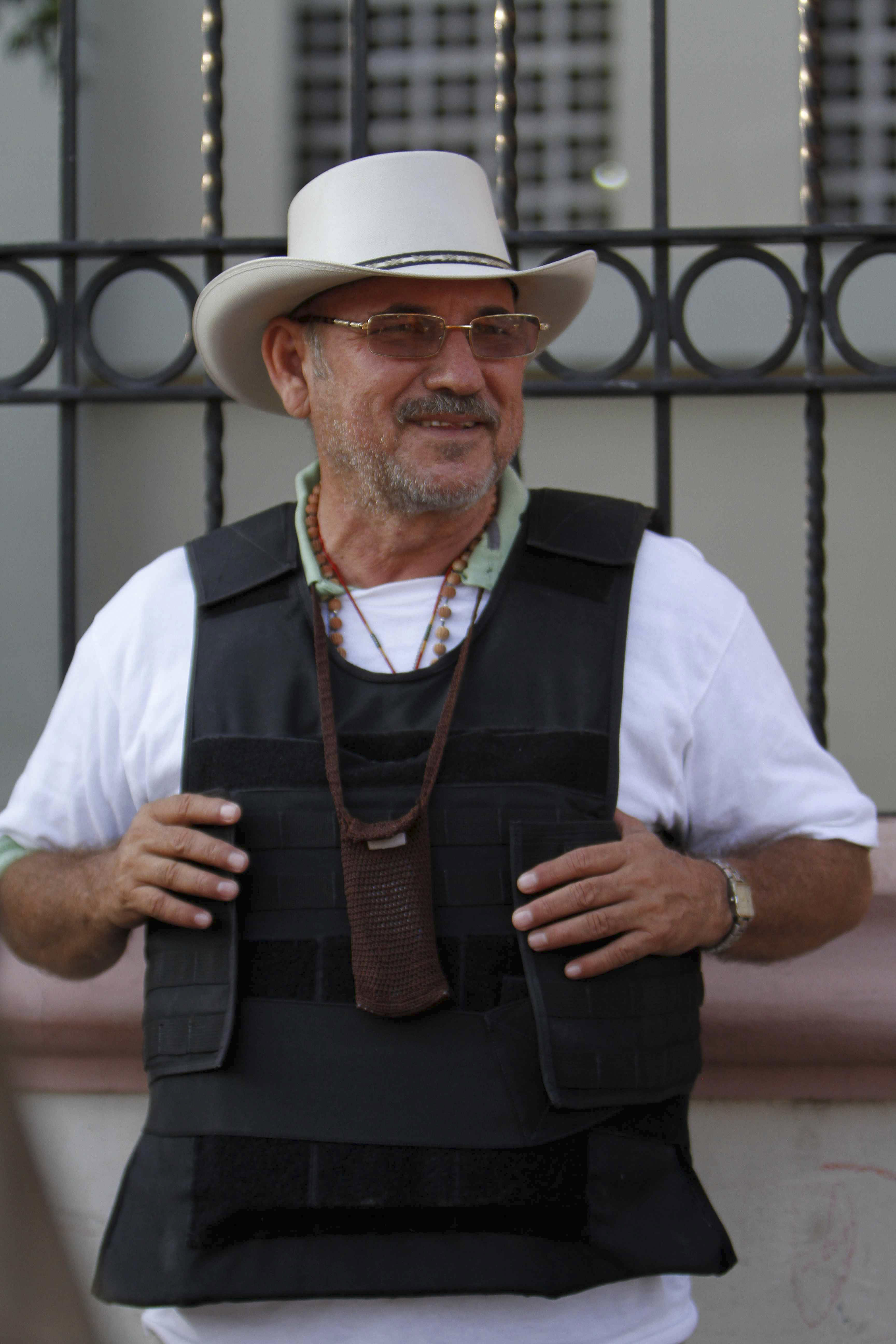 Mexico charges vigilante leader with murder