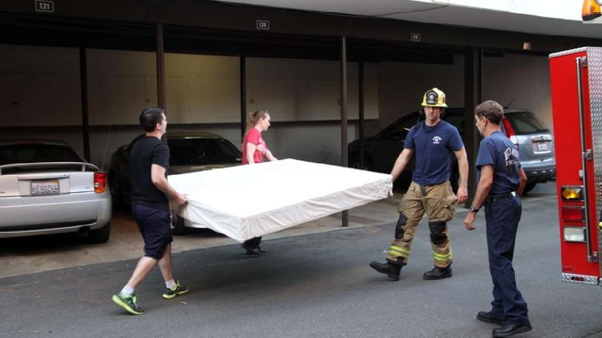 Toddler falling from window saved by stranger, mattress