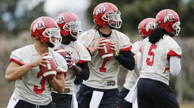 Utah Utes quarterback Travis Wilson (7) and
the other QBs throw during spring practice