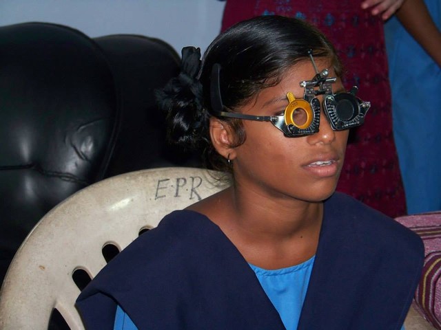 Sisters, brother outfit village children with glasses
