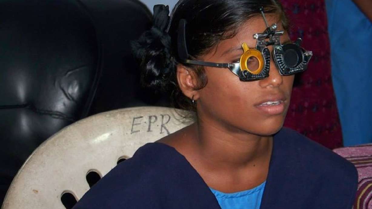 Sisters, brother outfit village children with glasses