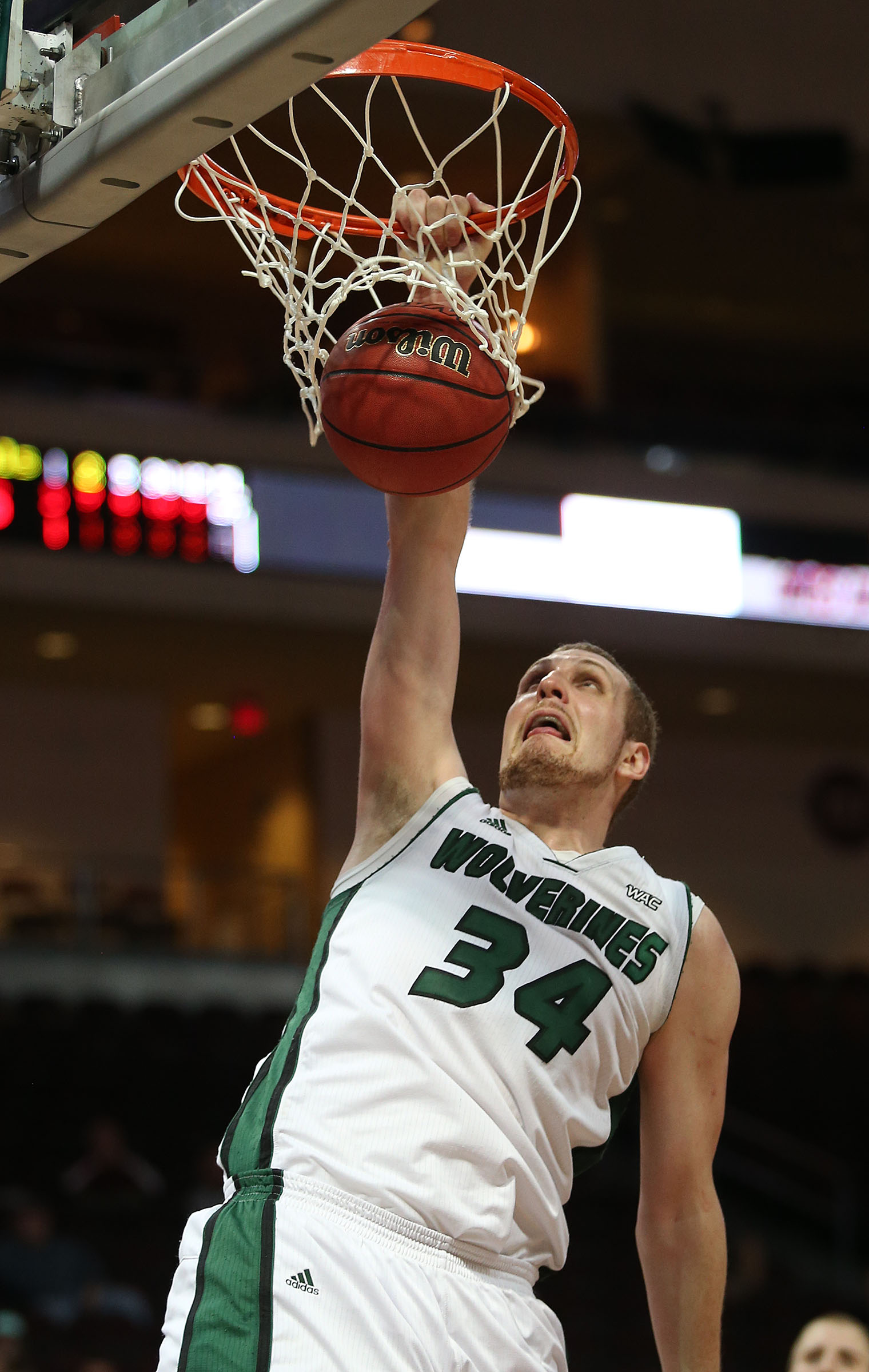 Utah Valley Wolverines center Ben Aird (34) dunks as Utah Valley 
University is defeated by Idaho 74-69 in the semi-finals of the WAC 
Men's basketball tournament Friday, March 14, 2014, in Las Vegas.