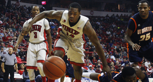Jamal Aytes (14) goes for a loose ball during a game against 
Tennessee-Martin. Aytes will be counted on to help replace Eric Mika's 
production.