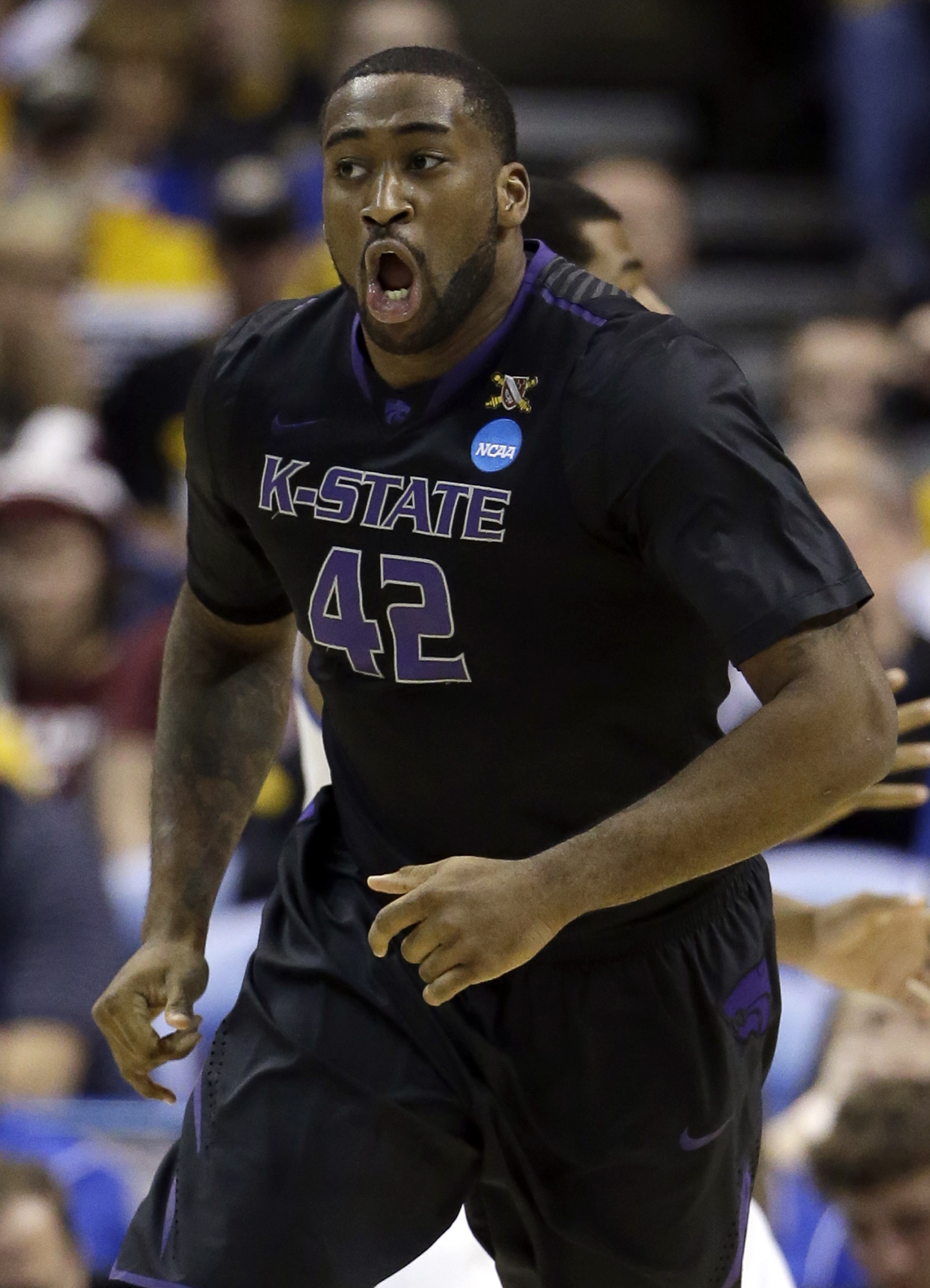 No. 8 seed Kentucky holds off Kansas State, 56-49
