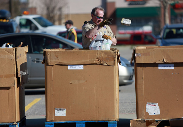 Bruce Denning helps with the 28th annual Scouting for Food drive to benefit the Utah Food Bank, regional food banks and emergency food pantries across the state at Elkridge Middle School in South Jordan on Saturday, March 22, 2014. (Photo: Kristin Murphy, Deseret News)