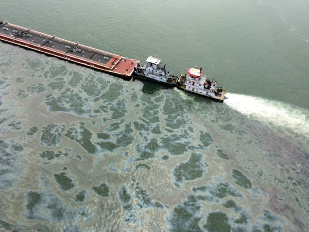 Oil spill cleanup impedes major Texas ship channel