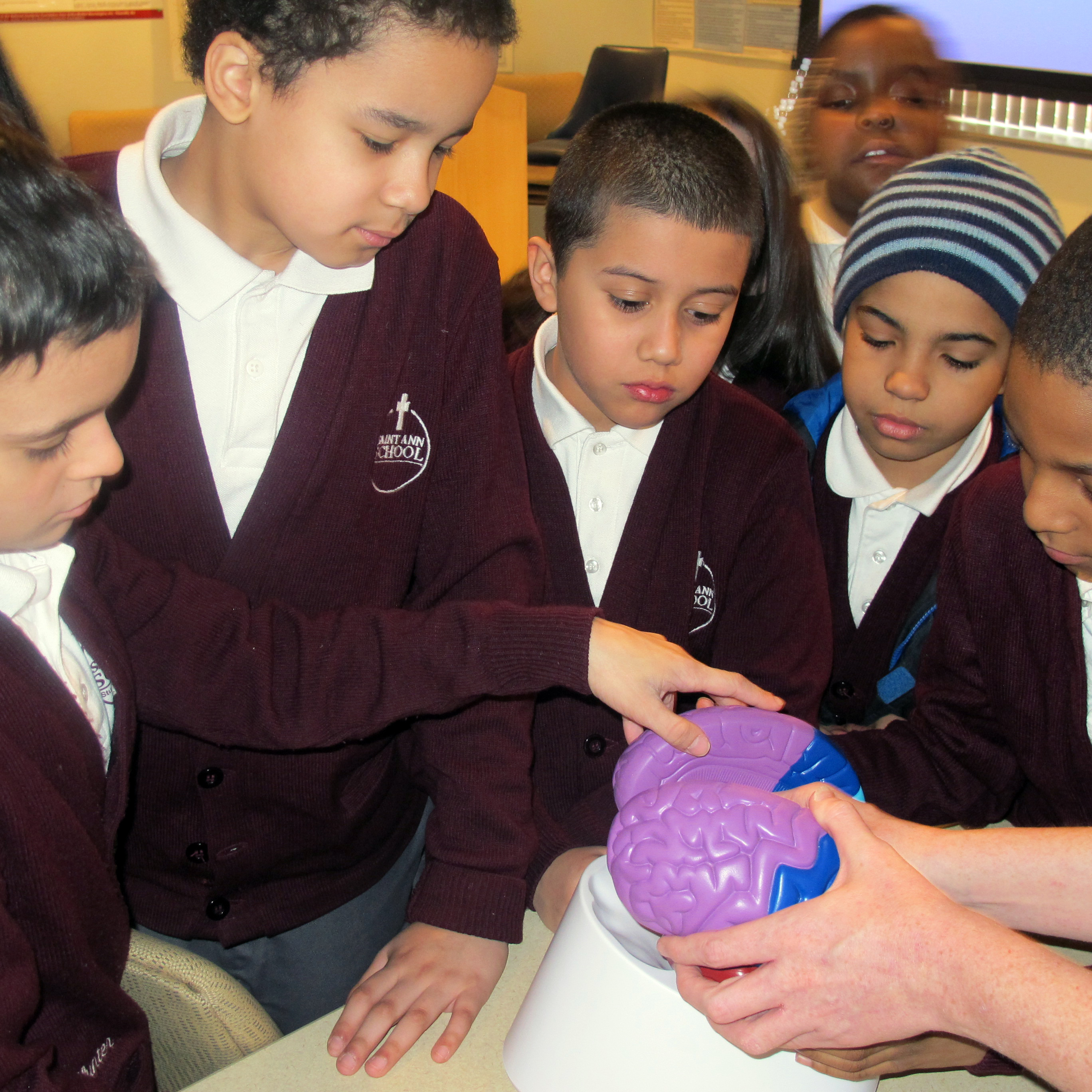 Kids learn stroke signs in class through imitation