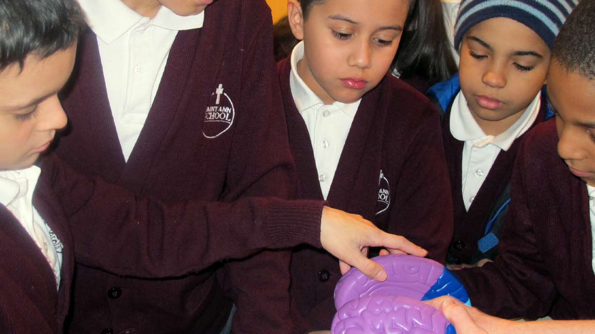 Kids learn stroke signs in class through imitation