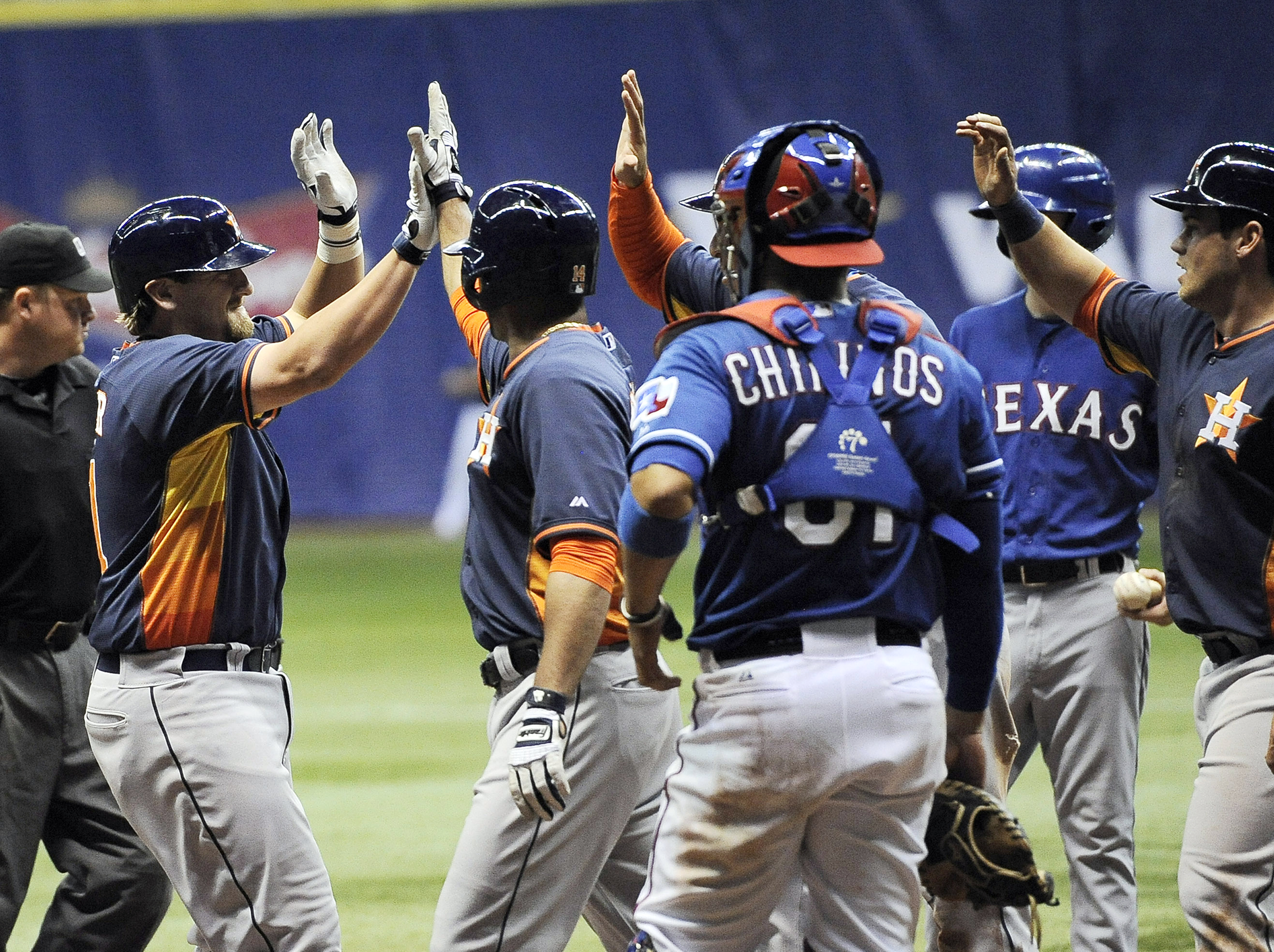 Astros slam Rangers 13-6 for Alamodome sweep