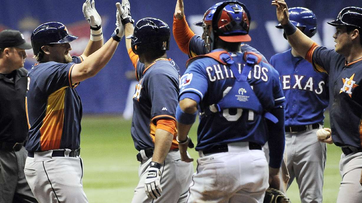 Astros slam Rangers 13-6 for Alamodome sweep