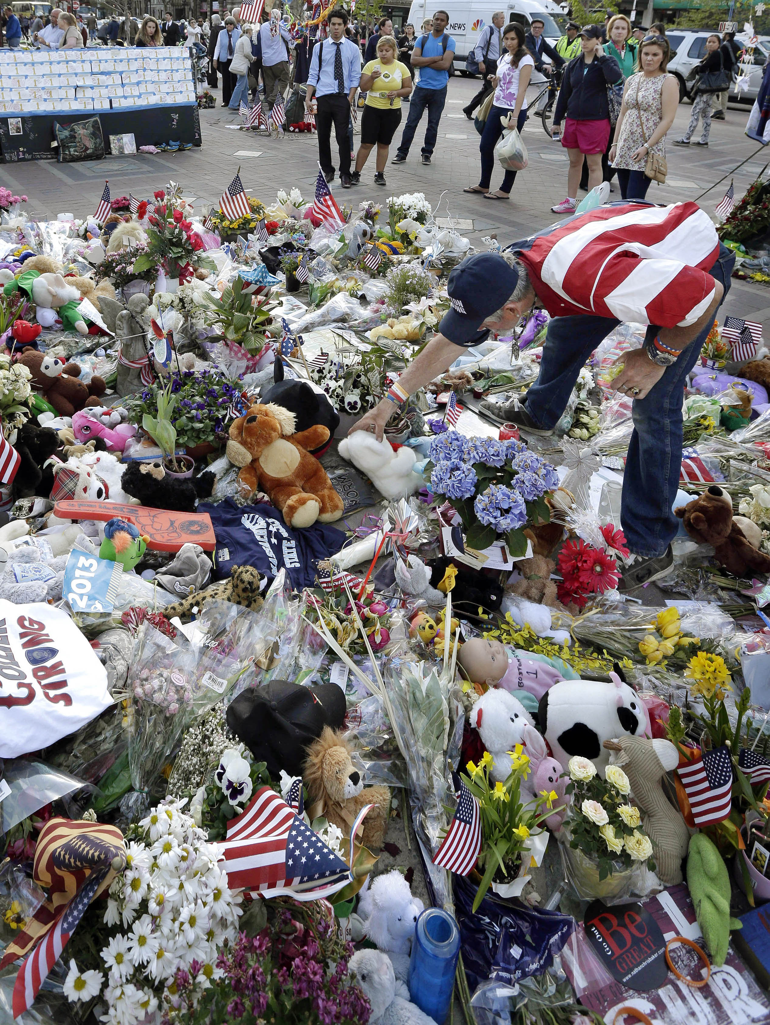 Boston bombing exhibit includes shoes, runner bibs