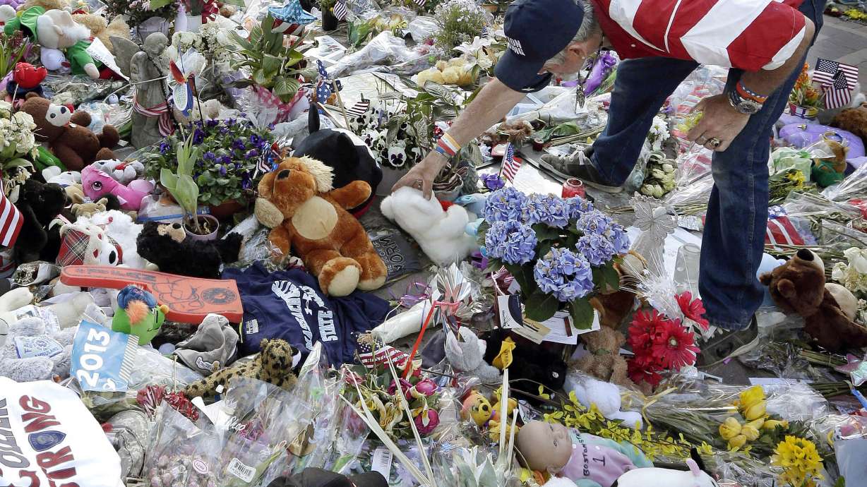 Boston bombing exhibit includes shoes, runner bibs
