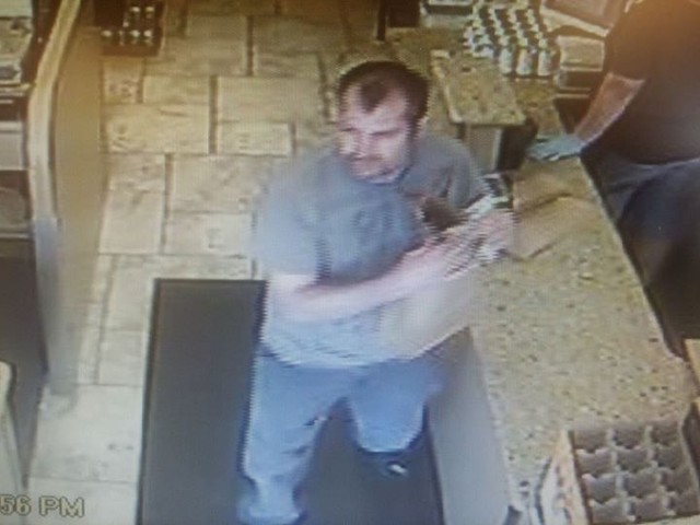Man steals car, rams gate after robbing Provo business