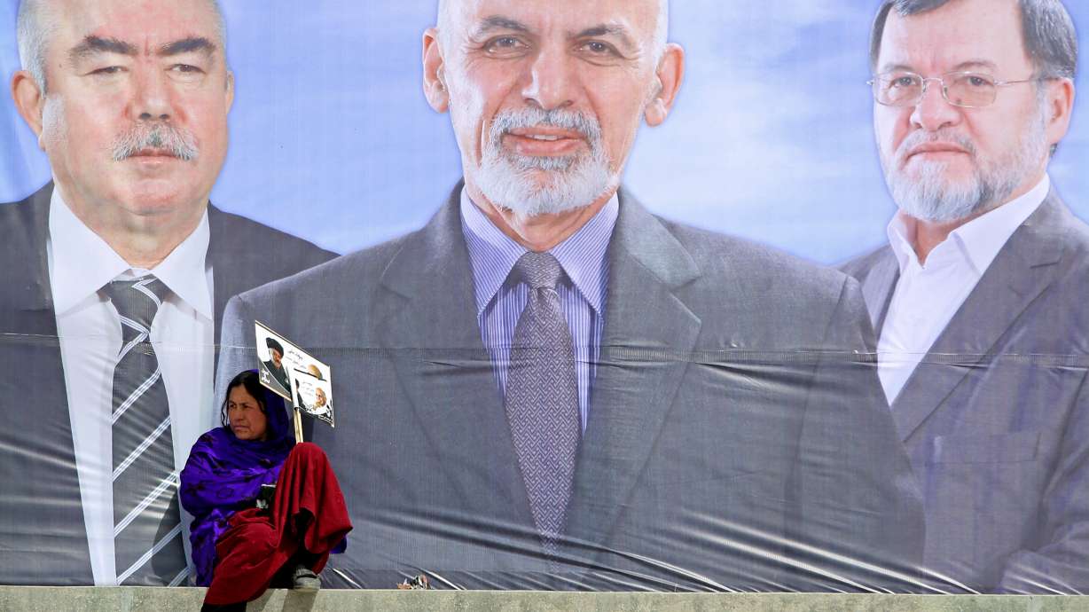 AP Interview: Afghan candidate praises Karzai