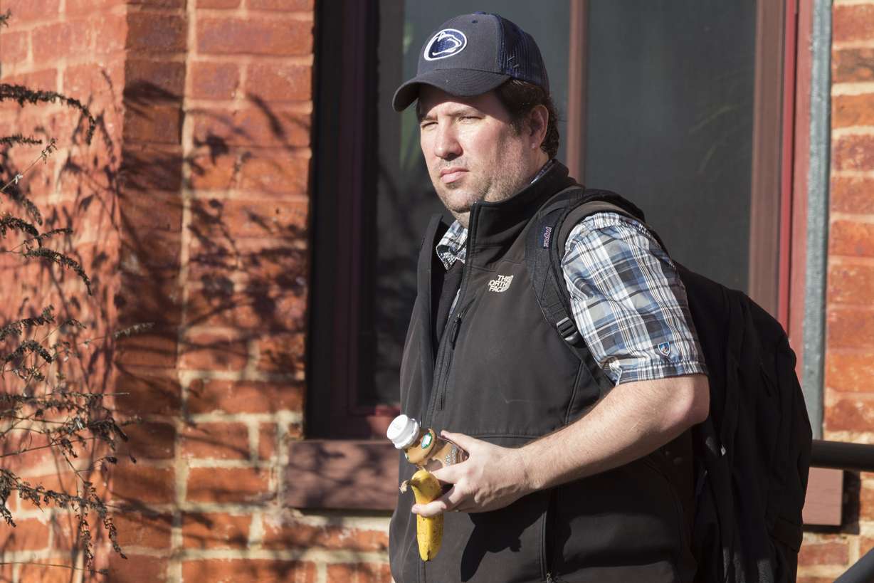 Joe McSpedon, a official of the U.S. Agency
for International Development, leaves his
house on Monday, March 31, 2014, in
Washington. McSpedon worked on a USAID
project that funded and helped create a
"Cuban Twitter," a communications network
designed to undermine the communist
government in Cuba, built with secret shell
companies and financed through foreign banks,
The Associated Press has learned. The
project, dubbed "ZunZuneo," slang for a Cuban
hummingbird’s tweet, was publicly launched
shortly after the 2009 arrest in Cuba of
American contractor Alan Gross.