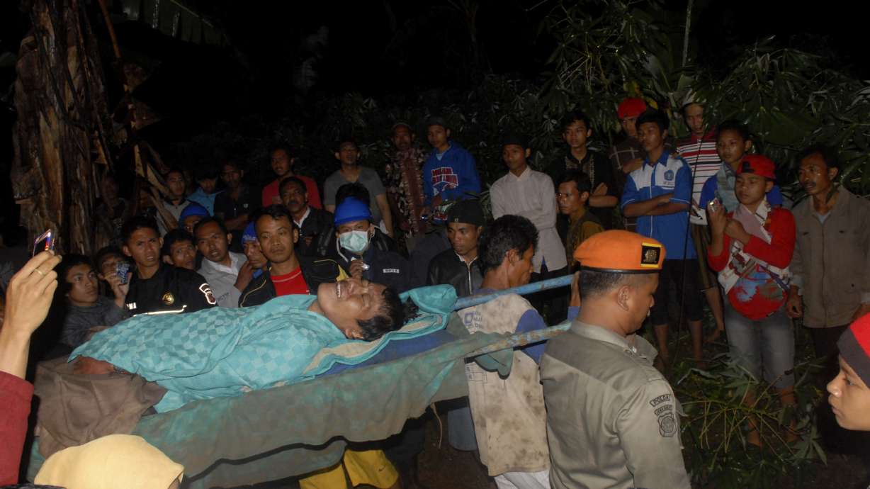 Indonesia train derails in landslide; 3 dead