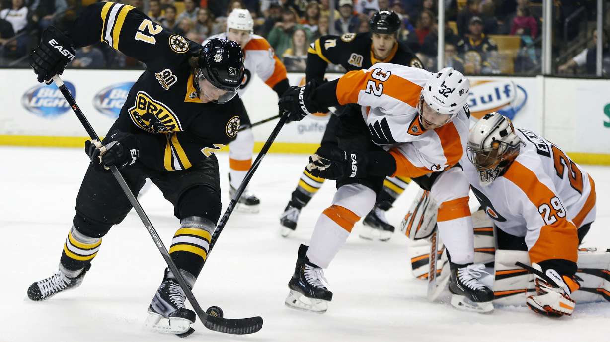 Bruins clinch top spot in East with 5-2 win