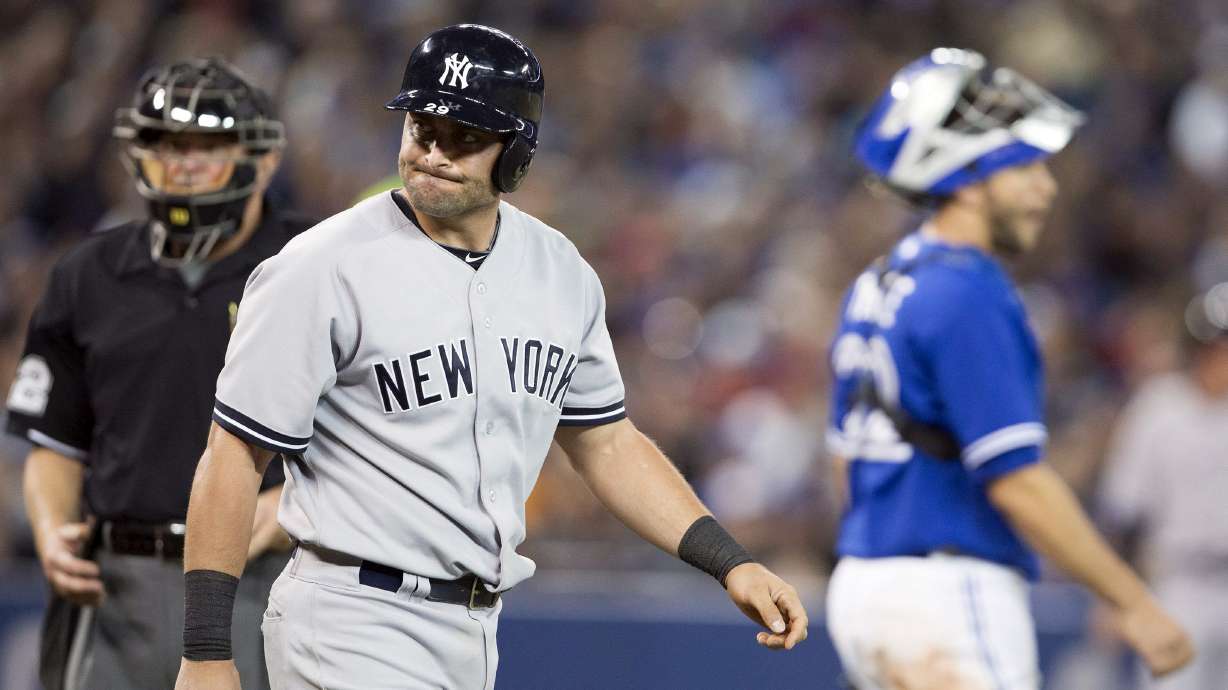 Dickey gets win as Blue Jays blank Yankees 4-0