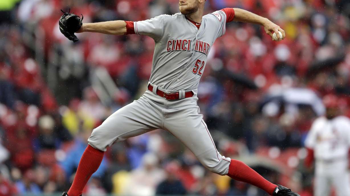 Cingrani out early, Reds lose to Cardinals 5-3