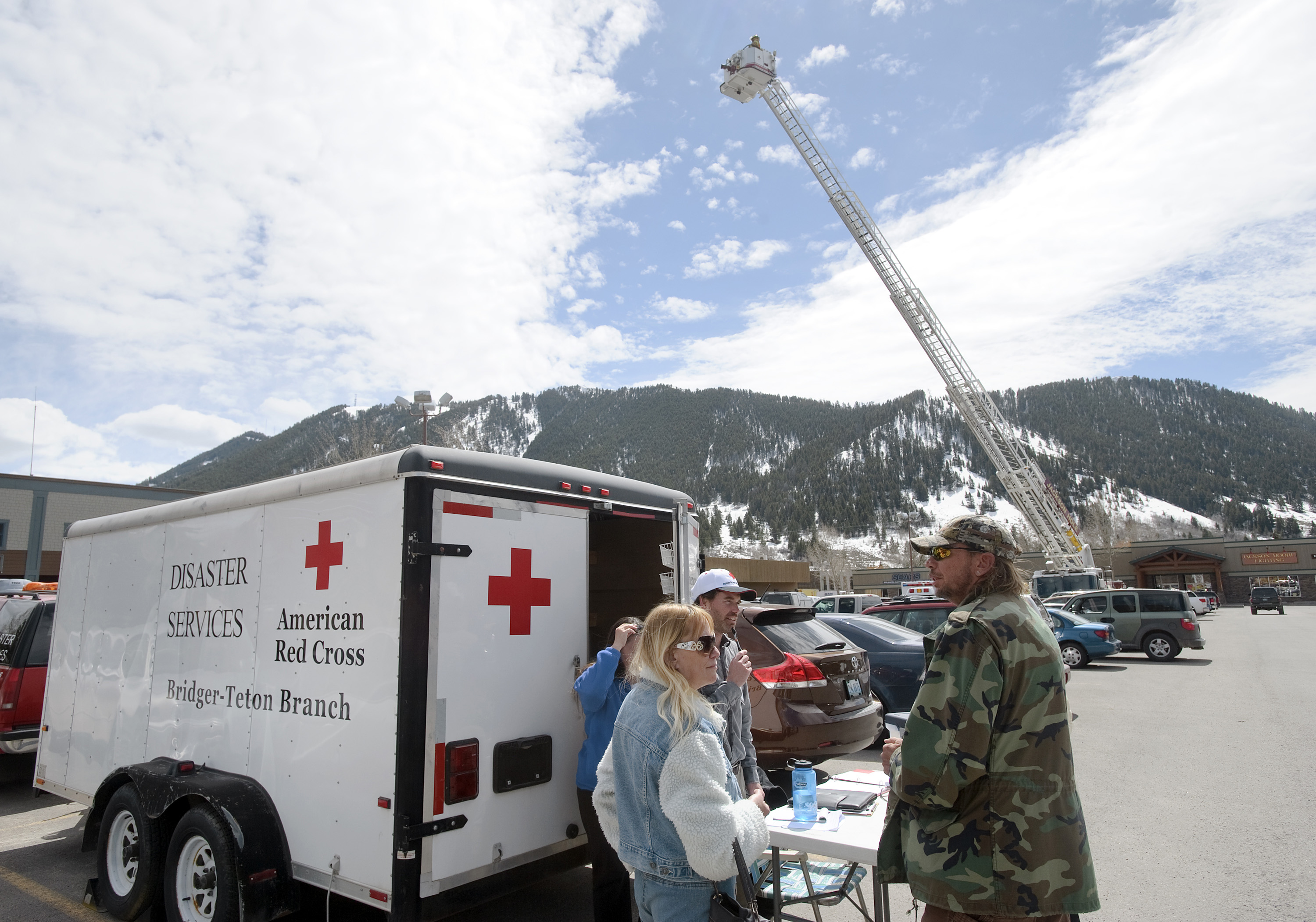 Wyoming evacuees keep wary eyes on slow slide