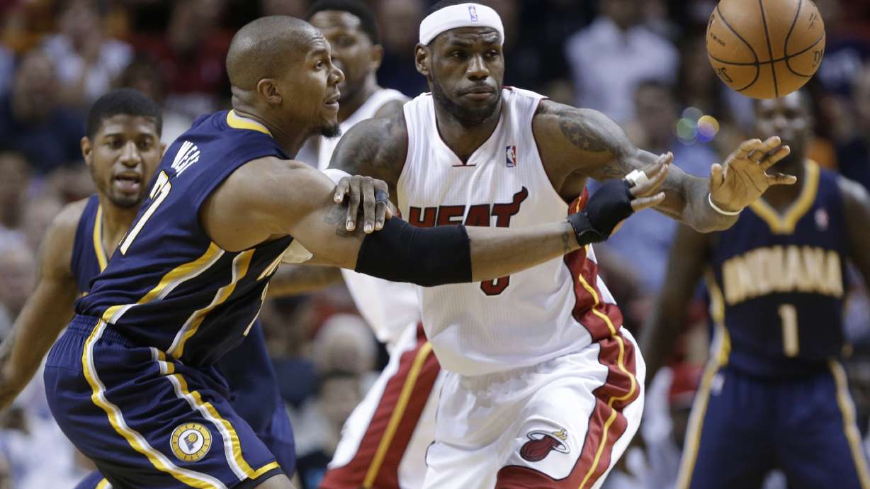 Heat back atop East, beat Pacers 98-86