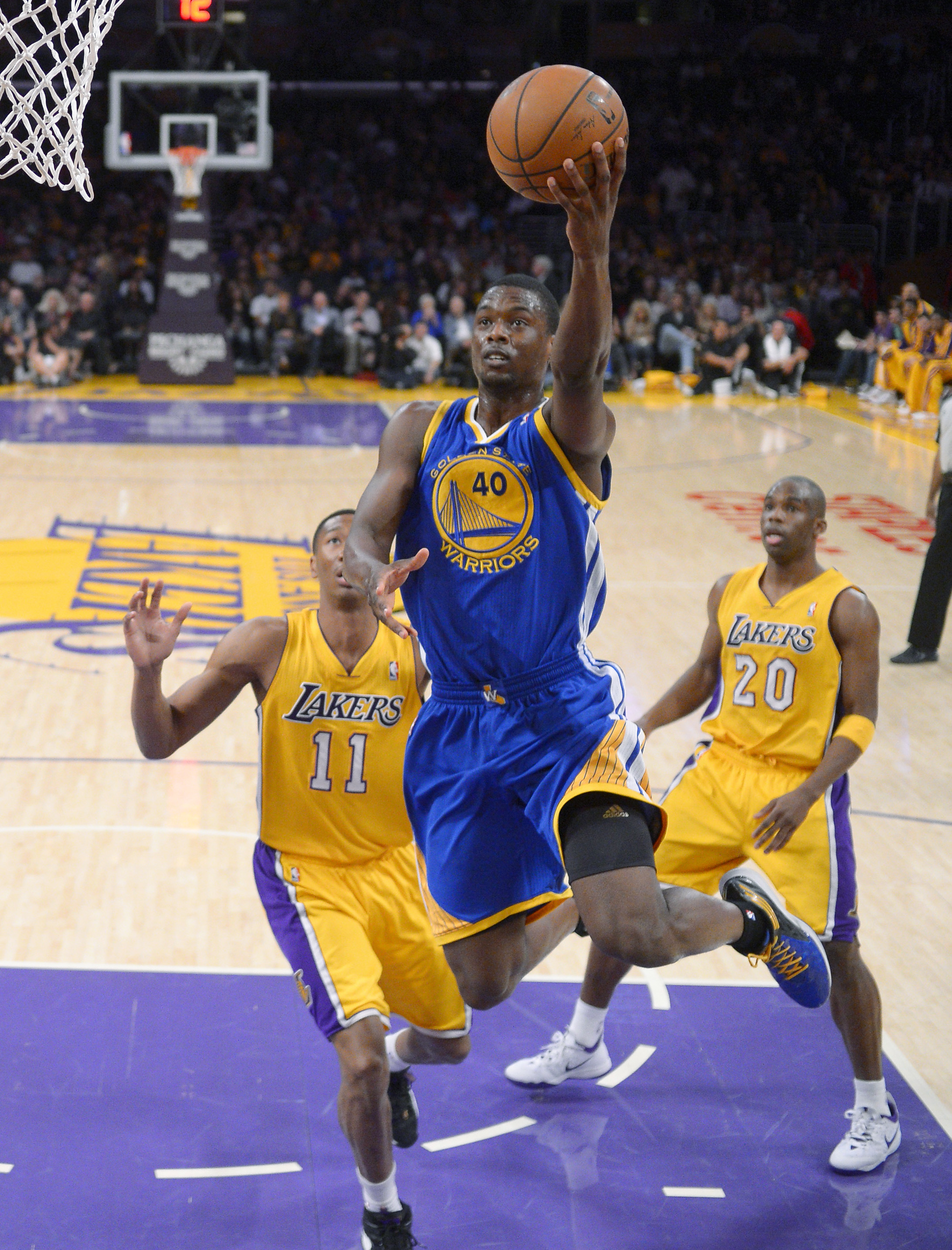 Warriors clinch playoff spot in win over Lakers