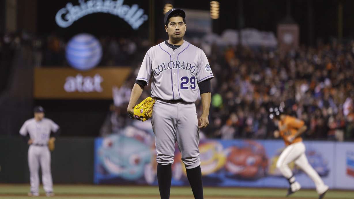De La Rosa serves up slam to pitcher, Rockies lose
