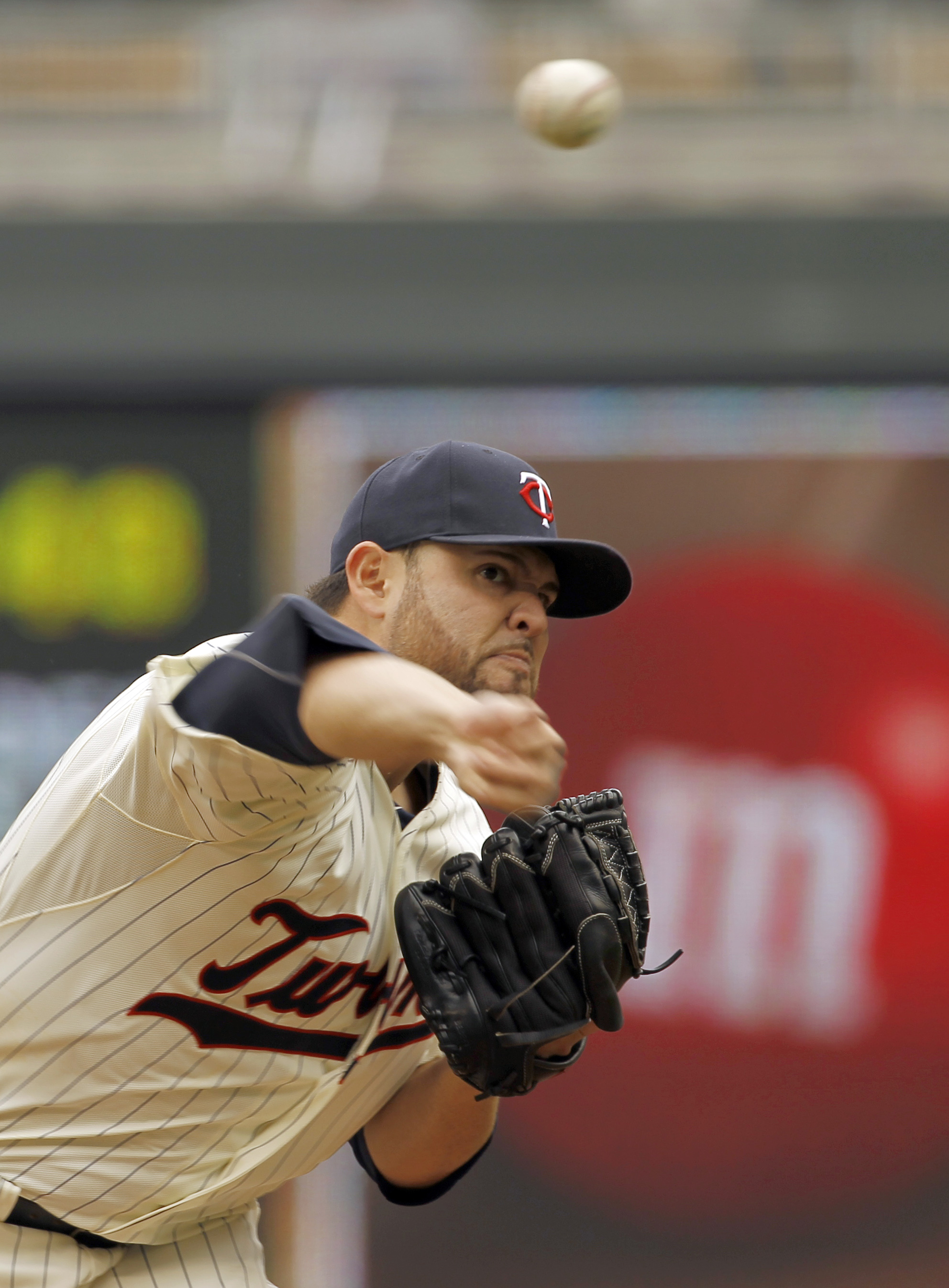 Mauer homers, Nolasco pitches Twins past Royals