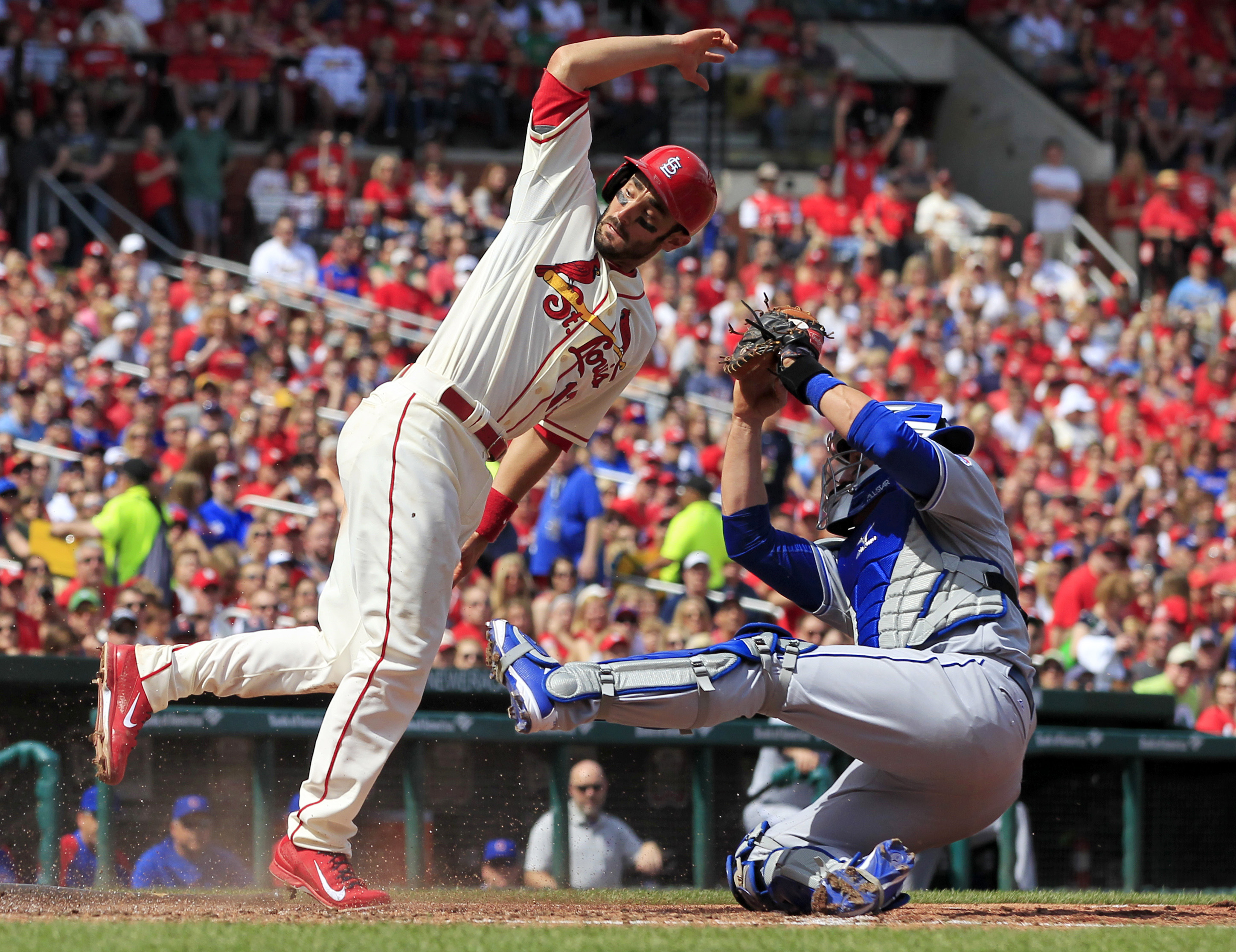 Carpenter, Wainwright help Cardinals top Cubs 10-4