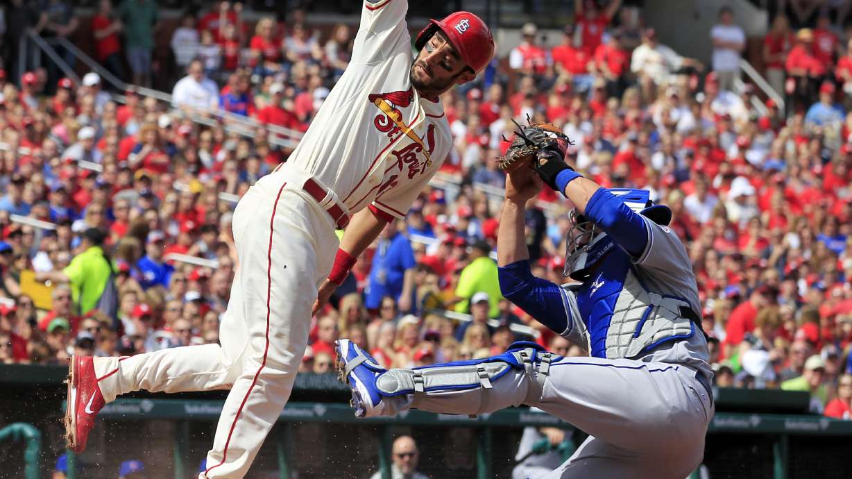 Carpenter, Wainwright help Cardinals top Cubs 10-4