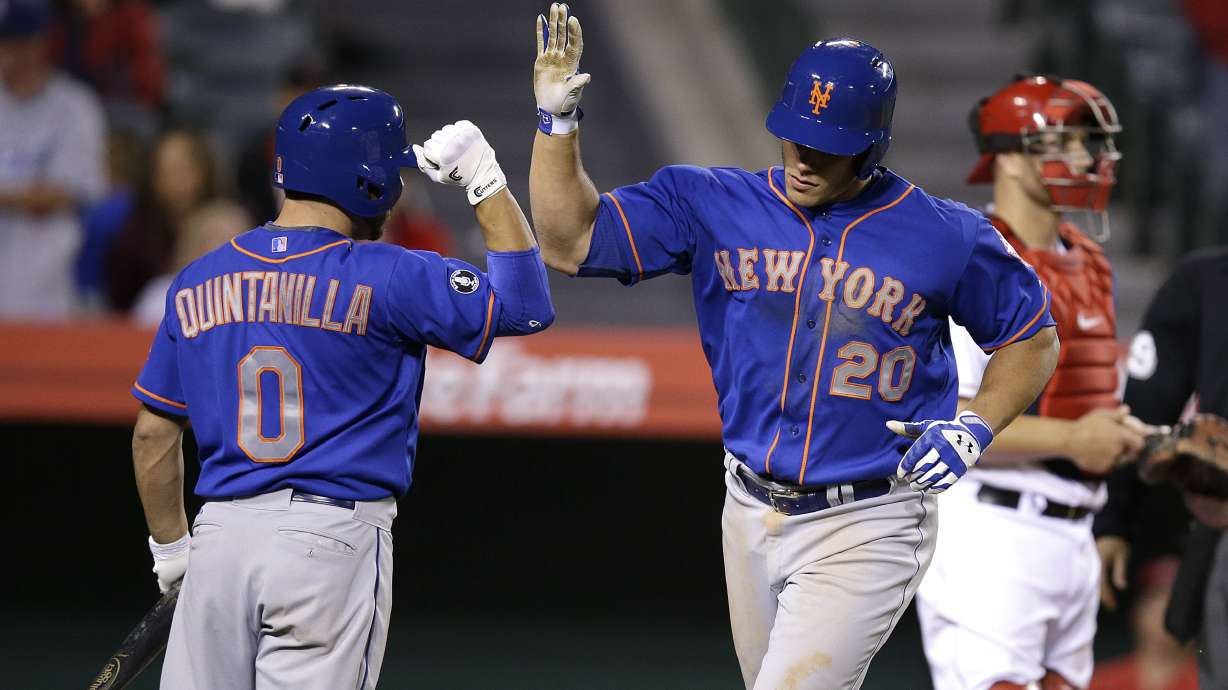 Mets beat Angels in 13th on Recker's HR