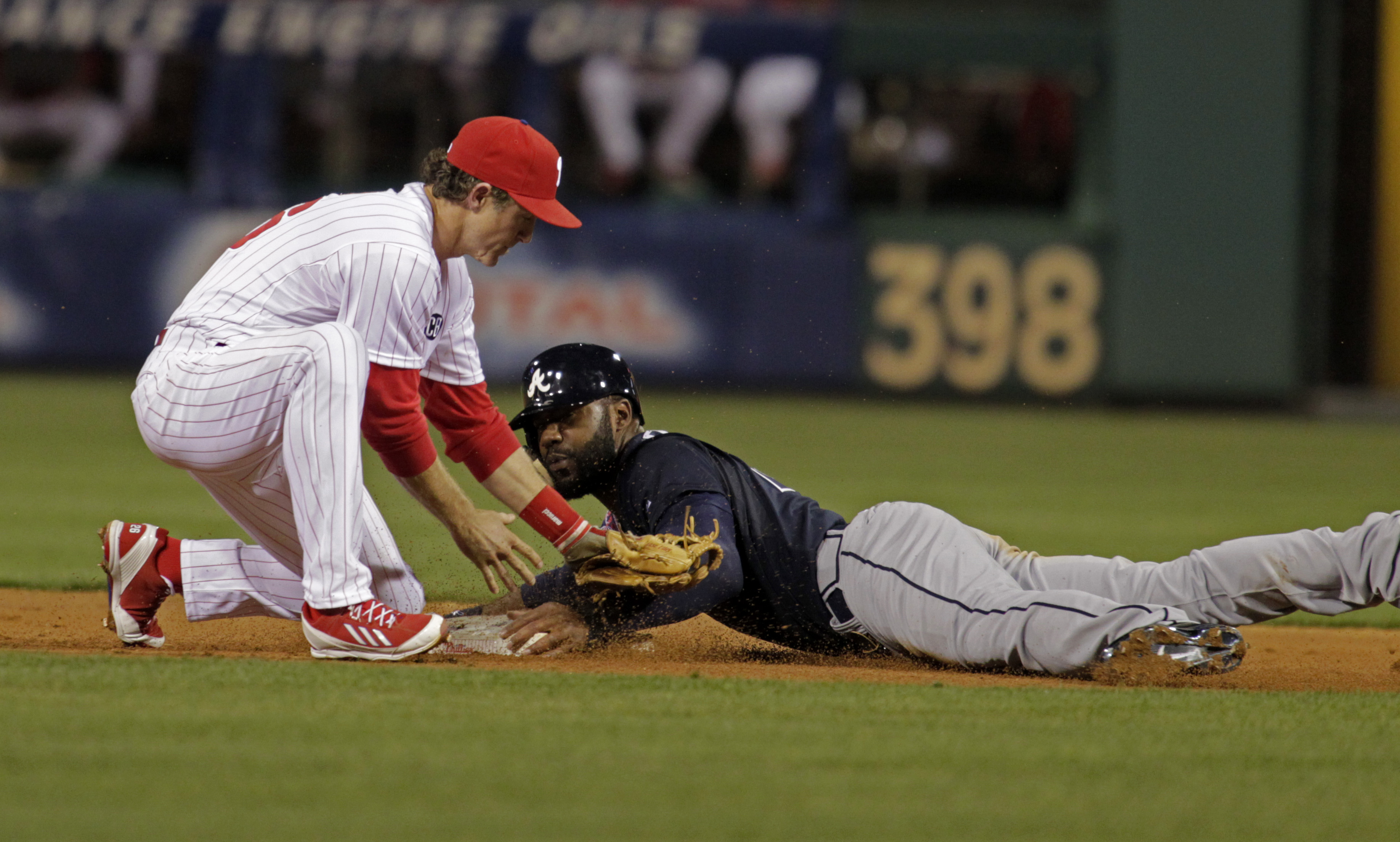 Uggla hits grand slam in 9th, Braves beat Phils