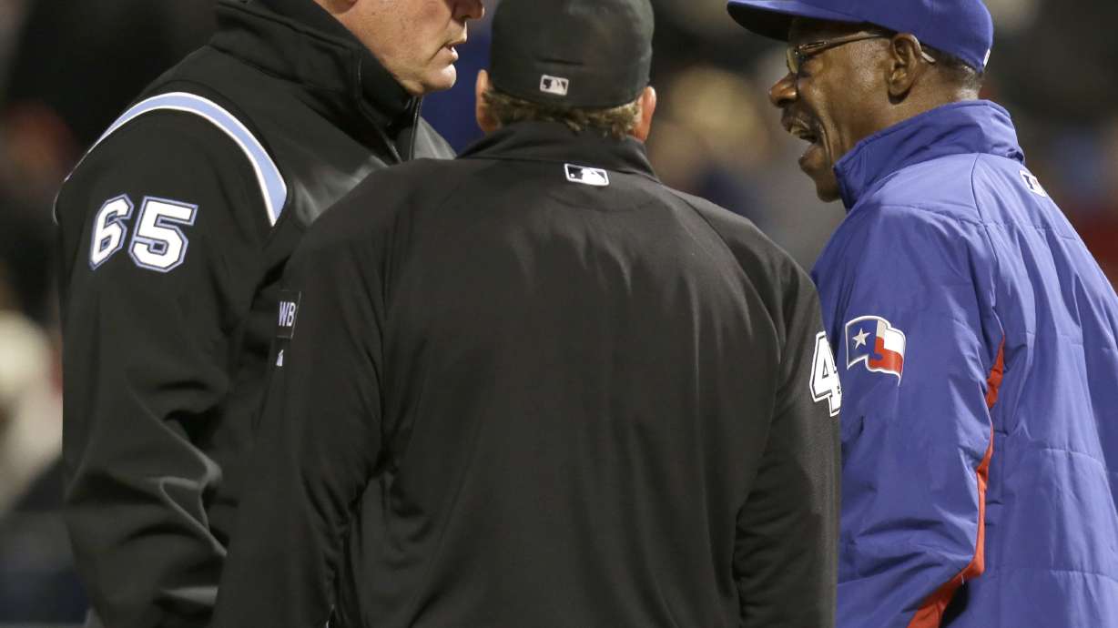 Mariners add run on replay, beat Rangers 7-1