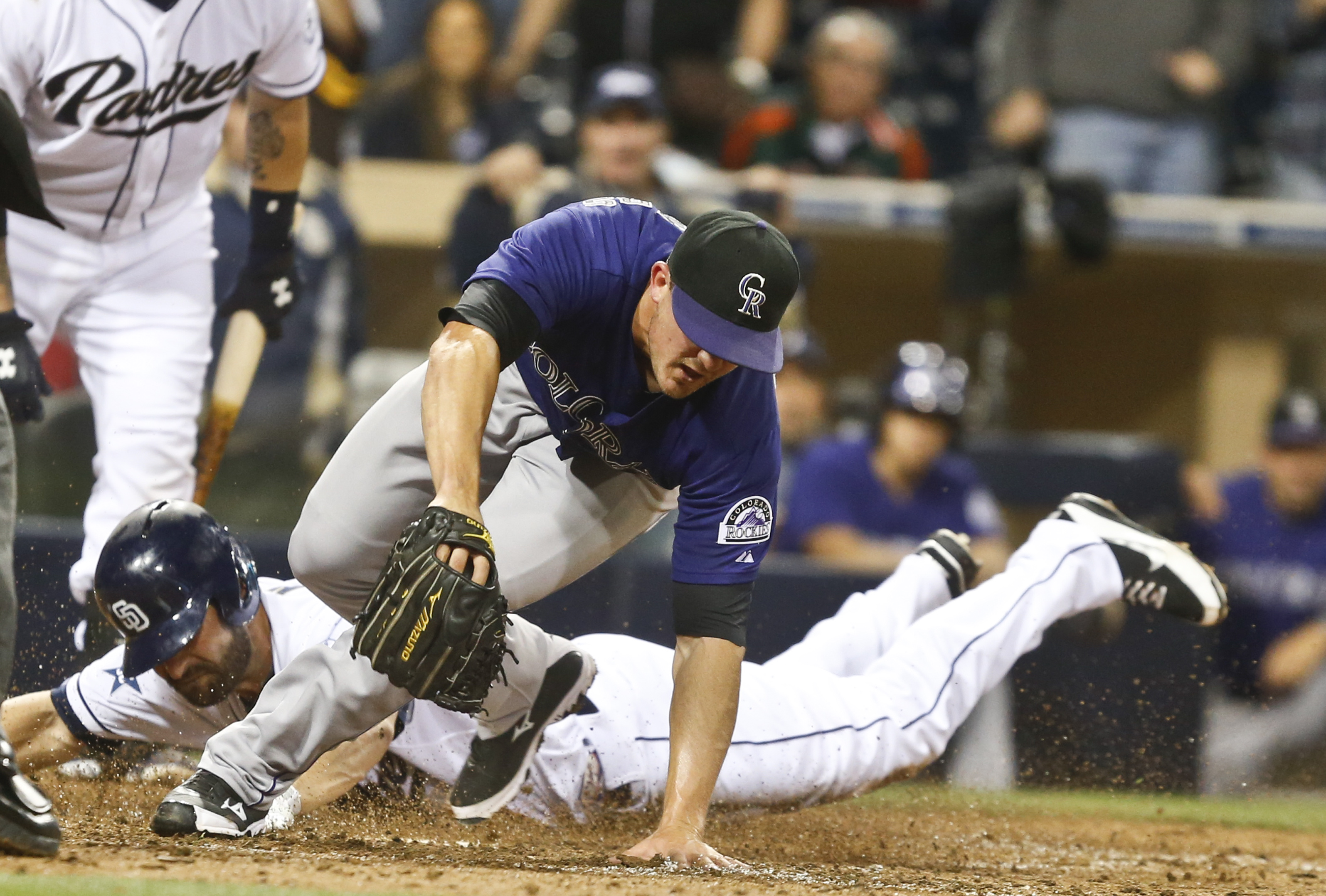 Brothers' wild pitch in 8th costs Rockies