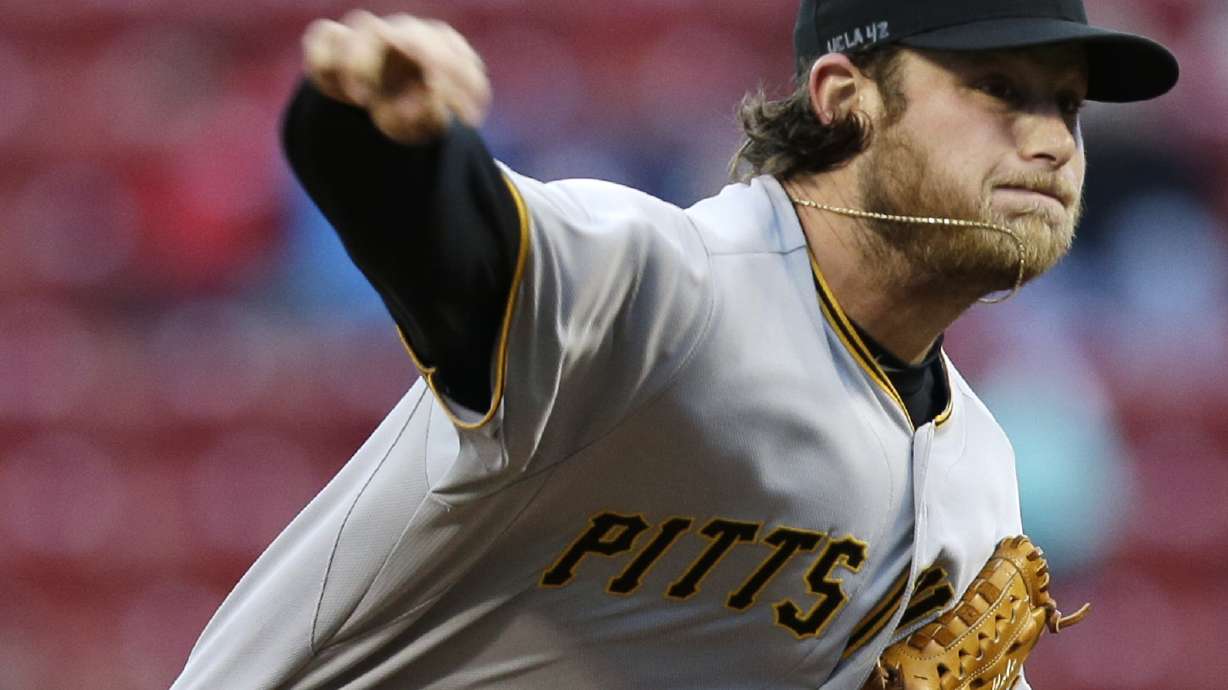Cole loses, Pirates beaten by Reds 7-5 for split