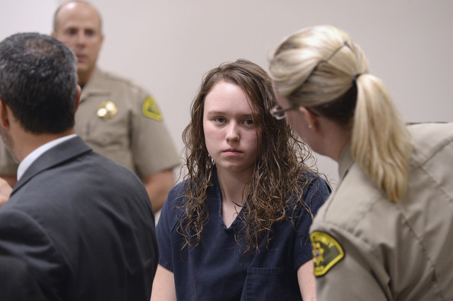 Meagan Grunwald enters her preliminary hearing in Judge Darold
McDade's courtroom in Provo, Utah, Wednesday, April 16, 2014.
(Al Hartmann, Pool /Salt Lake Tribune)