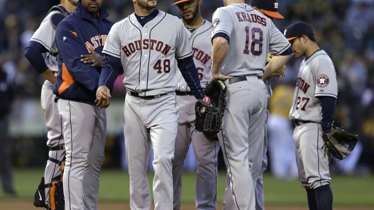 Astros fall behind early, lose to A's 11-3