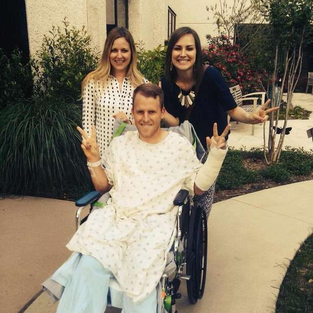 Sisters Shauna Cutler and AmyJo Aikele take their brother outside for
some fresh air at the hospital in Austin, Texas, Friday, April 18, 2014.
(Photo: Provided by AmyJo Aikele)