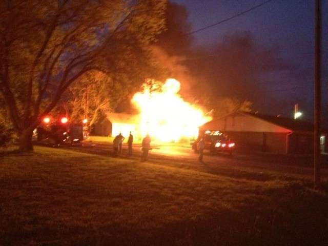 Embargo: Waco, TX Photo: A home burns at Ronda
and Reagan in West after a fertilizer plant
explosion Wednesday evening.