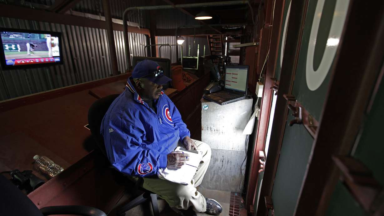 Scorekeeper at Wrigley practices dying art