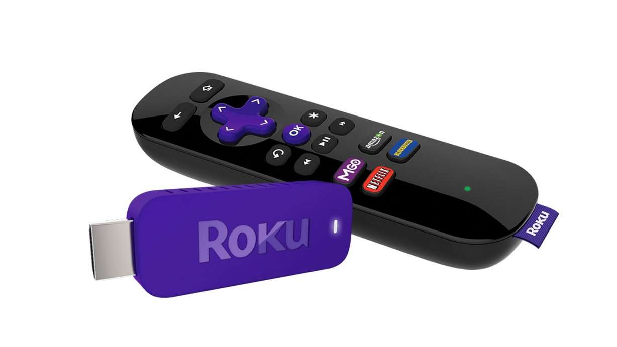 Roku's new Streaming Stick plugs into the HDMI port on the back of
your TV and comes with a remote control. (Courtesy Roku, Courtesy
Roku)