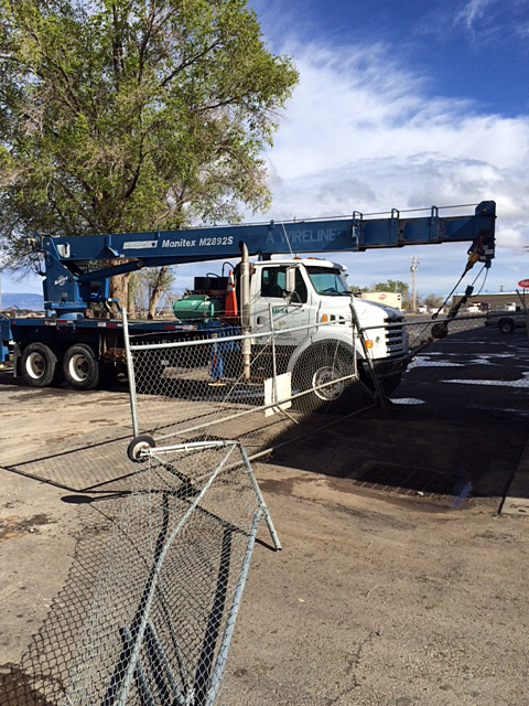Naples police arrested James Robert Olson, 30, Saturday, April 26, 2014, after a series of bizarre events. Olson crashed through chainlink fences at two businesses, tried to steal three trucks including this crane truck and fought with police after being stunned with a Taser, according to officers. (Photo: Naples Police Department)