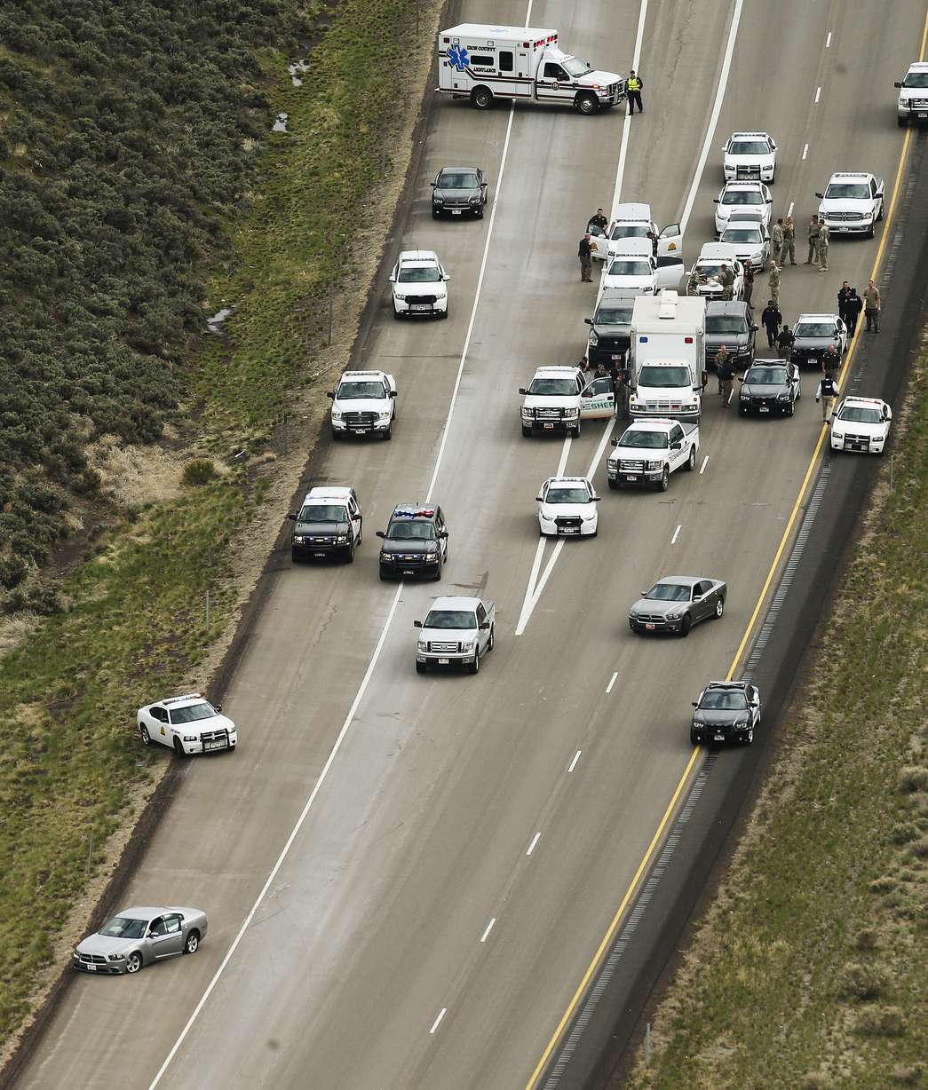 A suspect barricaded himself in his car with a
3 three old on I-15 after UHP stopped him in
Iron County Sunday, April 27, 2014. The suspect
gave himself up after a several hour standoff.