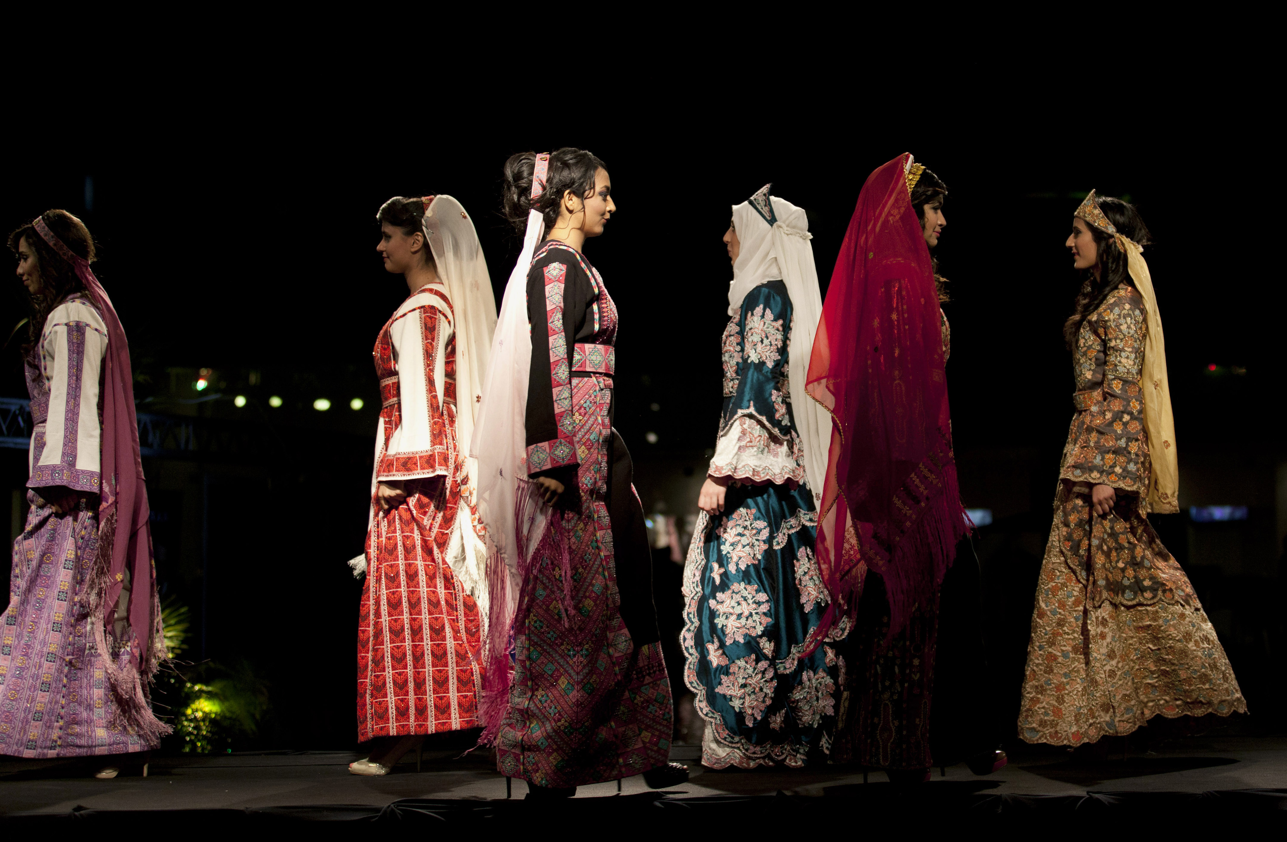 AP PHOTOS: Fashion show sweeps into West Bank