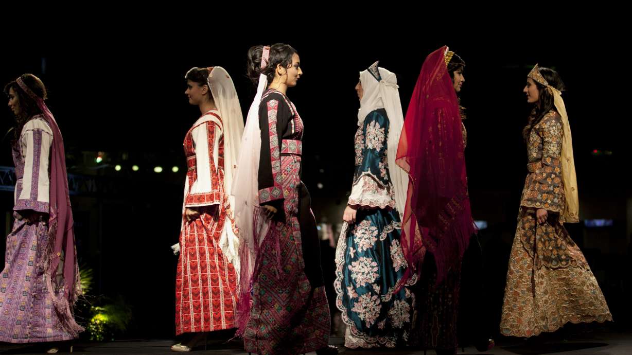 AP PHOTOS: Fashion show sweeps into West Bank